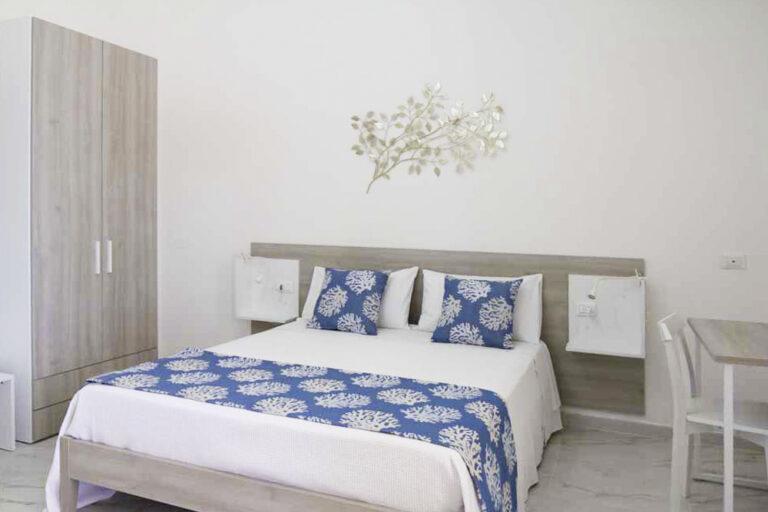La Paranza Apartments Lampedusa camera da letto Triglia Rossa